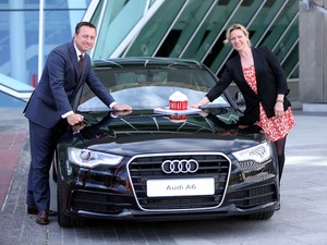 2012 Audi A6 exterior front promotional shot with Andrew Doyle and Rachel Allen