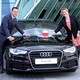 2012 Audi A6 exterior front promotional shot with Andrew Doyle and Rachel Allen