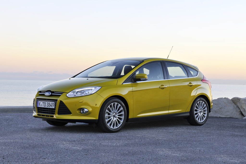 2012 Ford Focus hatchback exterior yellow front left side static